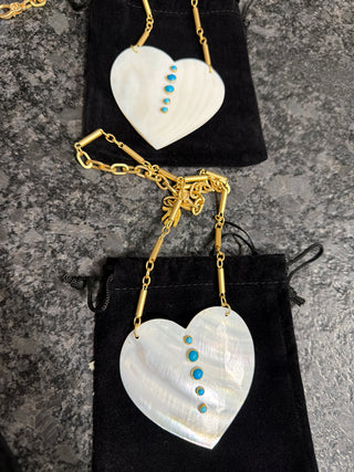 Handcrafted mother of pearl heart with turquoise gem