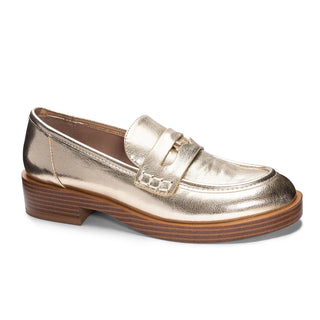 Gold loafer shoe on a white background