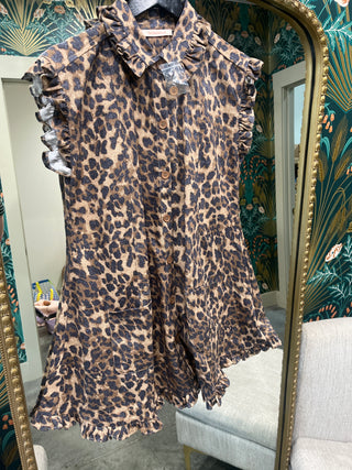 Sleeveless leopard print romper by Olivaceous with button-front closure, ruffled armholes, and flounced hem